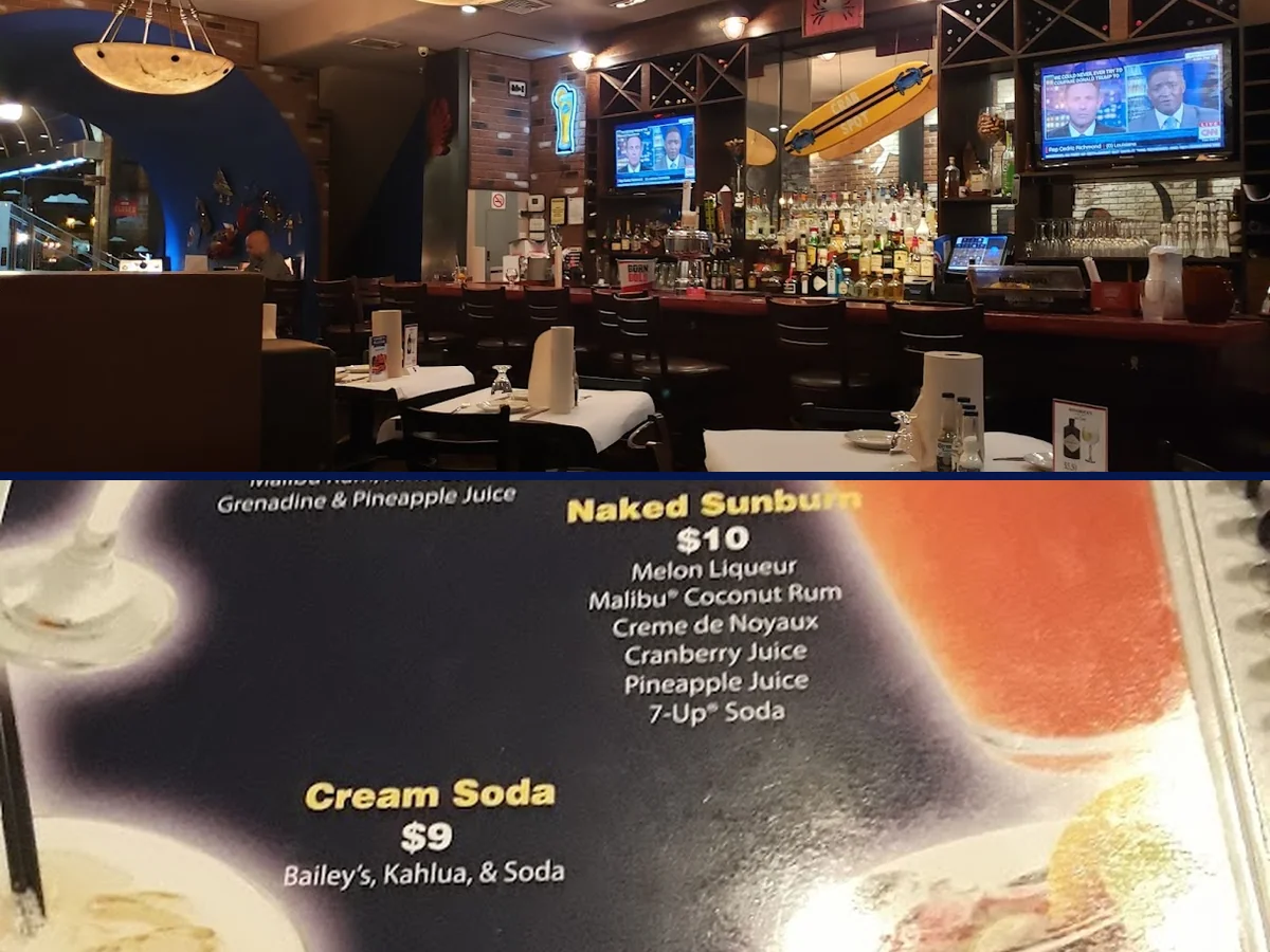 Mixed seafood dishes served family-style on a table.