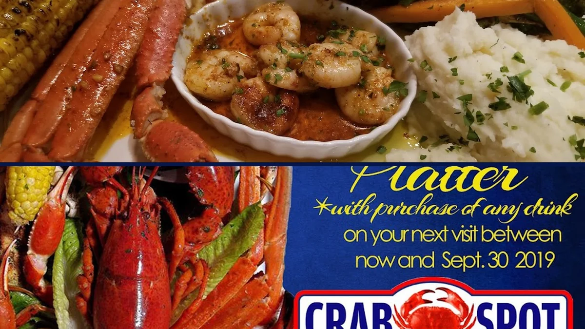 Steamed crab and seafood boil spread on a table.