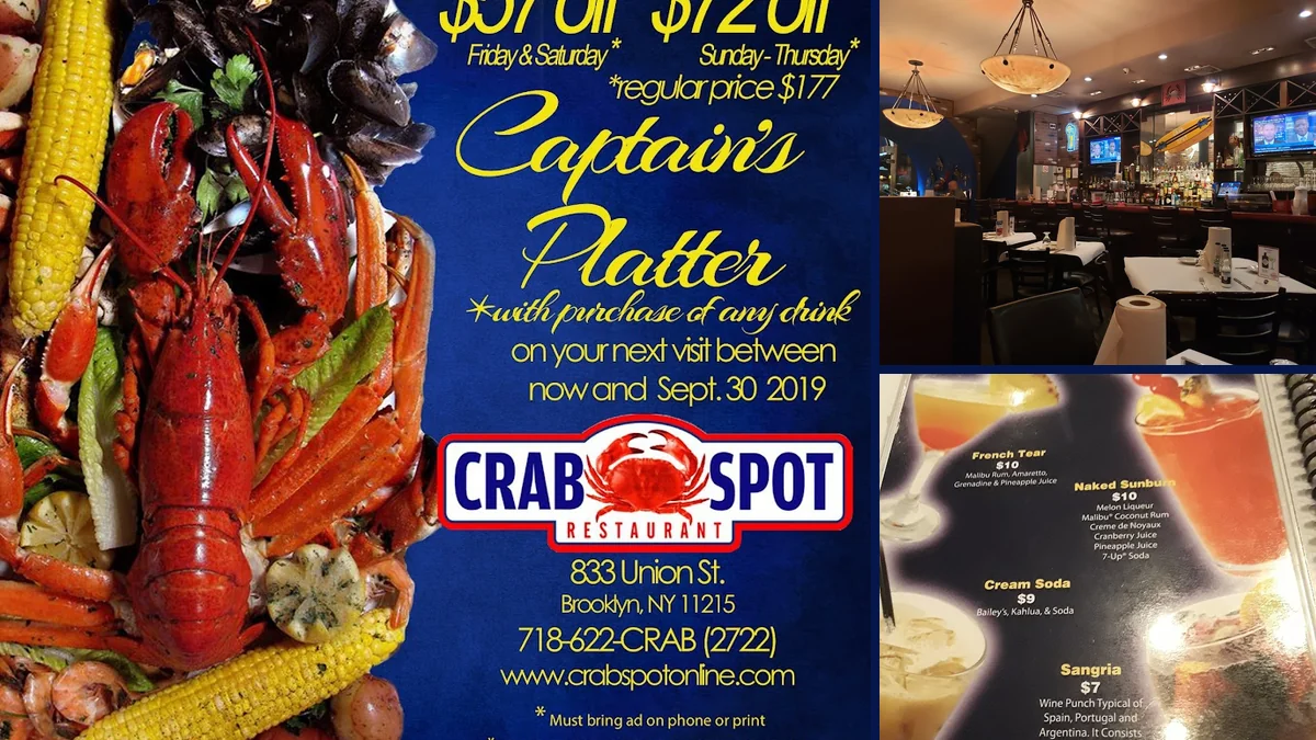 Steamed crab and seafood boil spread on a table.